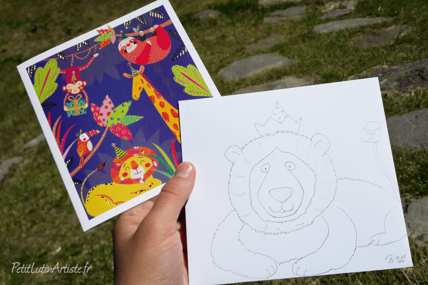 photo d'une carte postale avec un lion. j'ai dessiné un lion sur l'enveloppe blanche