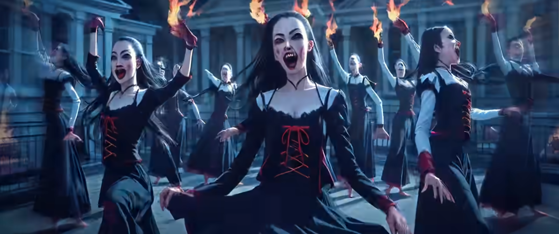 screenshot of the clip Damantion Flame, where the singer and her back dancers are made skeletons or vampires by AI. their hands and faces are weird